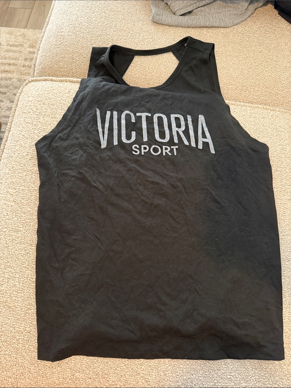 Victoria Sport Black Logo Tank with sparkly lettering and open back